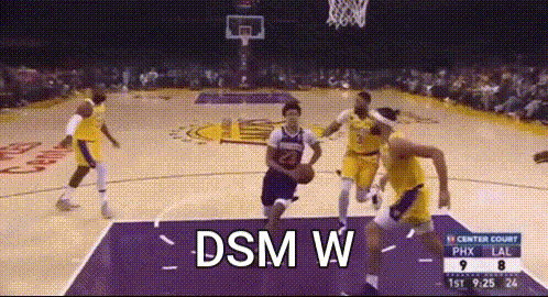 a basketball game is being played with the words dsm w on the bottom right