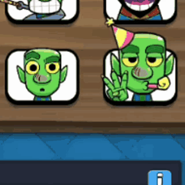 a bunch of green cartoon characters are on a wooden table .