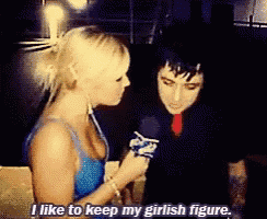 a woman is talking to a man with the words " i like to keep my girlish figure " above her