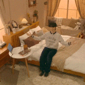 a person wearing a sweater that says follow on it