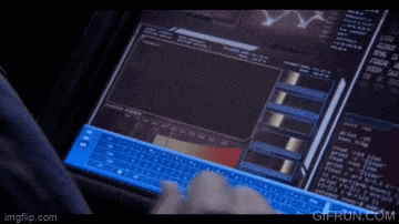a person is typing on a blue keyboard in front of a computer screen that says gifrun.com