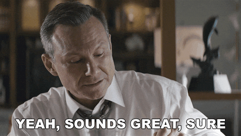 a man in a white shirt and tie says " yeah, sounds great, sure "
