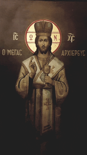 a painting of jesus holding a chalice with the letters ic on the top