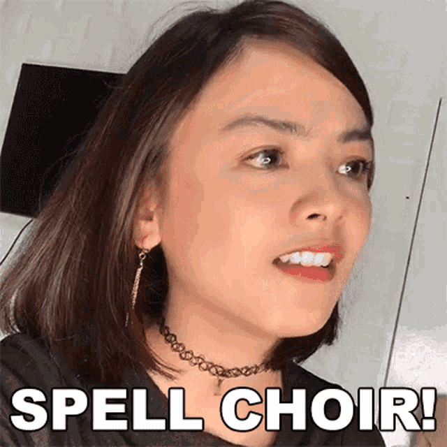 a close up of a woman 's face with the words spell choir written below her .