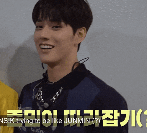 a close up of a person 's face with nsik trying to be like junmin