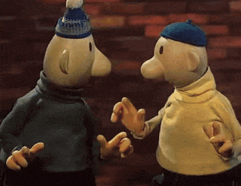 two cartoon characters are standing next to each other
