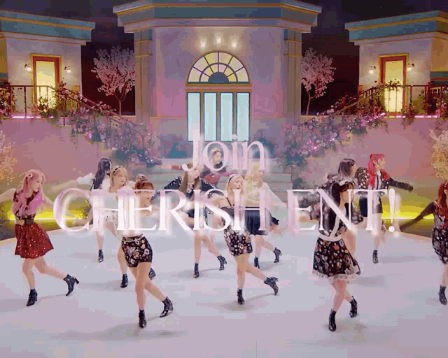 a group of women are dancing in front of a sign that says join cheerful ent