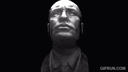a black and white photo of a man 's head with the website gifrun.com visible