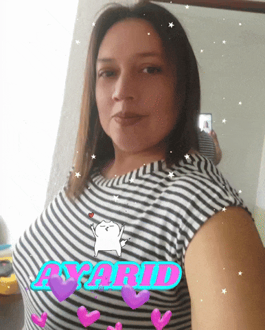 a woman in a striped shirt with the word ayarid on it