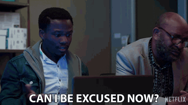 a man sitting in front of a laptop with the words can i be excused now on the bottom