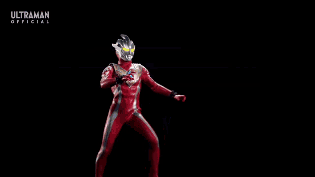 a person in a red superhero costume is being hit by a light beam .