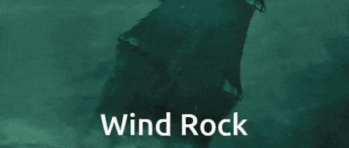 wind rock is written on a green background with a sailboat in the background