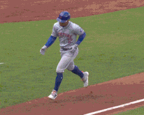a new york mets baseball player wearing a helmet and sunglasses