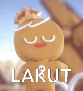 a gingerbread man with a crown on his head and the word " lakut " below him