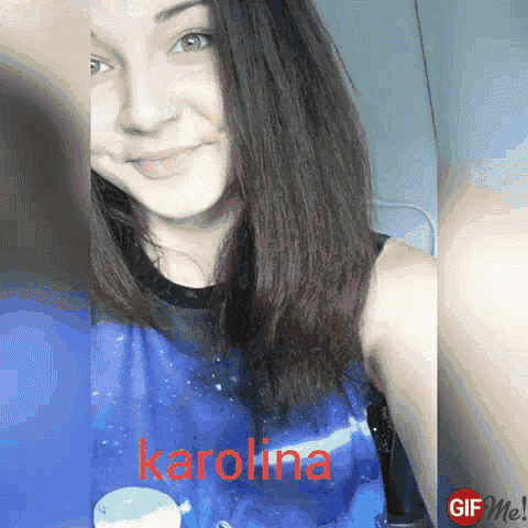 a girl with the name karolina on her shirt is smiling