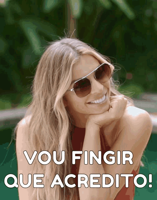 a woman wearing sunglasses is smiling with the words vou fingir que acredito below her
