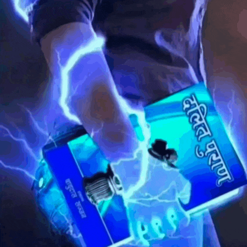 a person is holding a blue book with a lightning bolt behind them