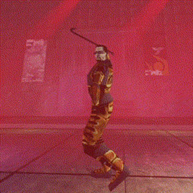 a pixelated image of a man holding a cane in a red room