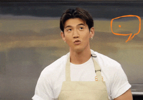 a man wearing an apron has the number 83 on it