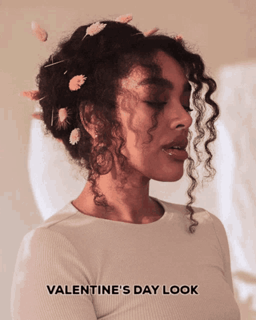 a woman with flowers in her hair and the words valentine 's day look