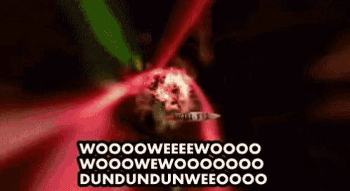a blurred image of a flower with the words woooo weeeeewoooo woooo weeeeewoooo dundundunweeooo