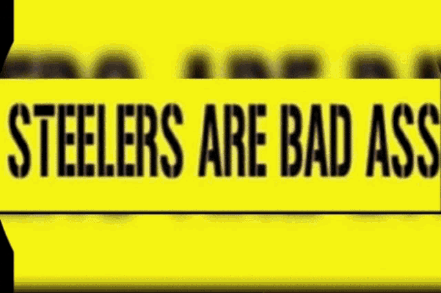 a yellow sign that says steelers are bad ass on it