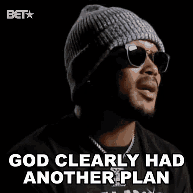 a man wearing sunglasses and a hat says `` god clearly had another plan ''