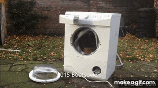 a picture of a broken washing machine with the year 2015 on the bottom