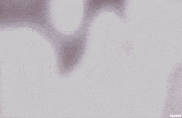 a blurry picture of a group of people dancing in front of a white background .