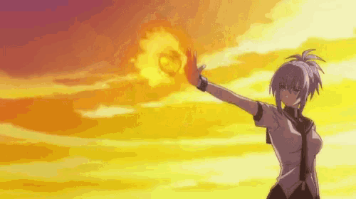 a girl in a white shirt is holding a fireball in her hand .