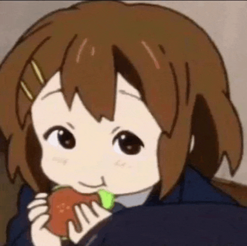 a cartoon girl is eating an apple while leaning on a couch .
