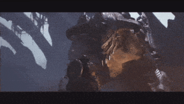 a monster with horns is standing next to a man