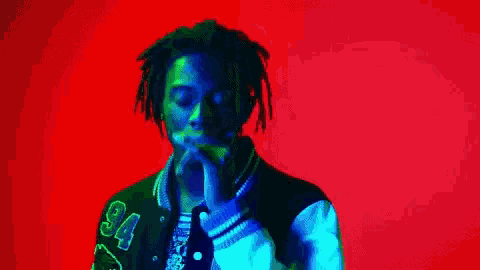a pixel art of a man wearing a jacket with the number 34 on it