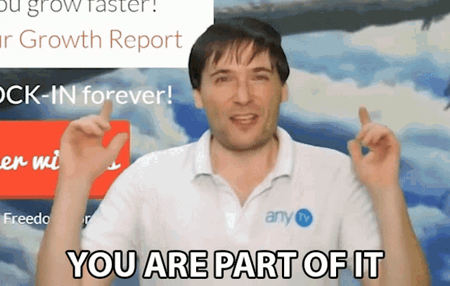 a man wearing a shirt that says any tv on it says you are part of it