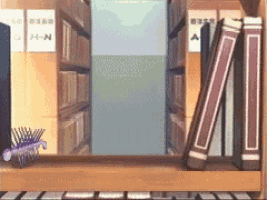 a row of books on a shelf one of which has the letter a on it