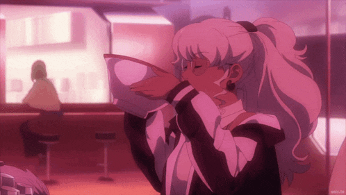 a girl is drinking from a bowl with a purple background