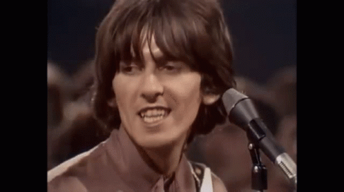 The Beatles George Harrison GIF - The Beatles George Harrison Singing GIFs