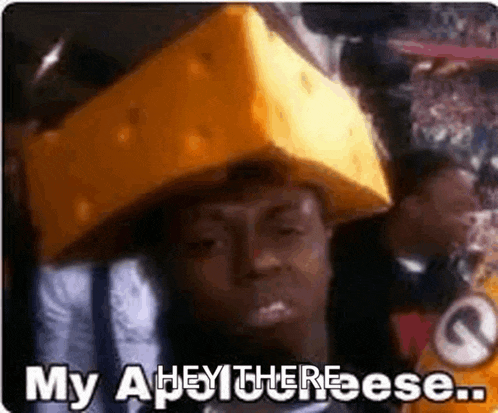 a man is wearing a cheese hat and saying `` my apey there cheese . ''
