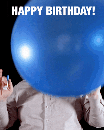 a man blowing up a blue balloon with the words happy birthday written on the bottom