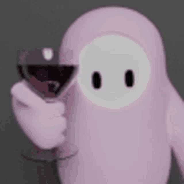 a pink penguin is holding a glass of wine in its hand .