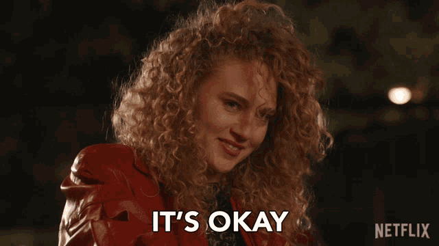 a woman with curly hair says it 's okay on a netflix ad