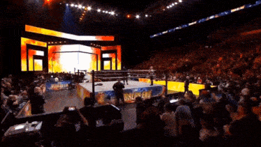 a wrestling ring with a banner that says worlds end on it