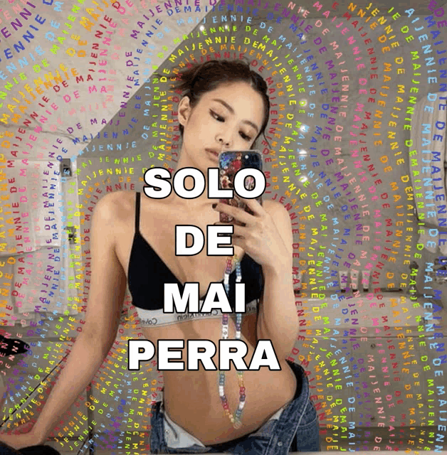 a woman taking a picture of herself with the words solo de mai perra below her