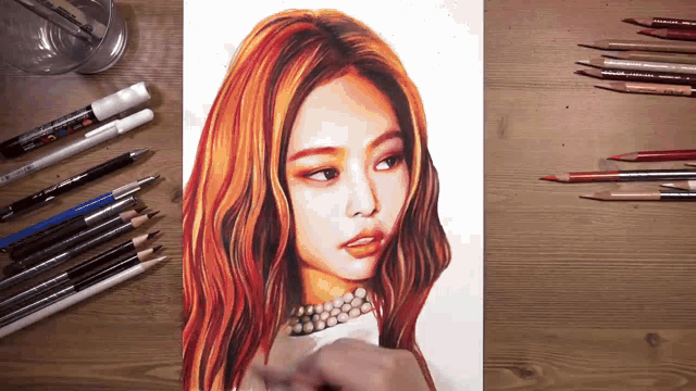 a drawing of a woman 's face is surrounded by colored pencils and markers