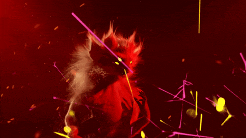 a red furry creature with yellow eyes is surrounded by yellow lights