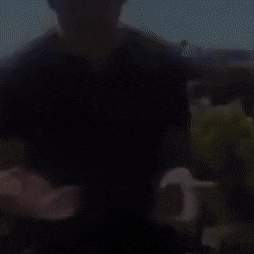 a blurry picture of a man wearing a black shirt