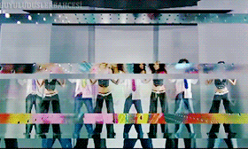 a group of people are dancing on a stage with a watermark that says joyyoluduslerbarcesi