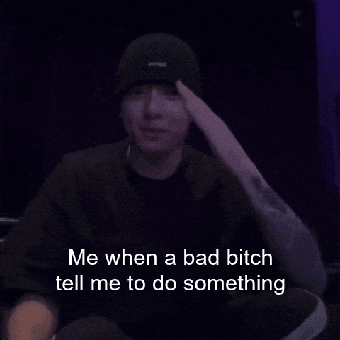 a man wearing a beanie and a black shirt says me when a bad bitch tell me to do something