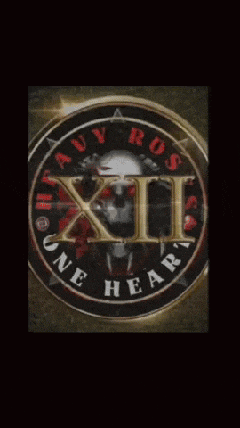a logo for heavy ross xii one heart with a skull in the center