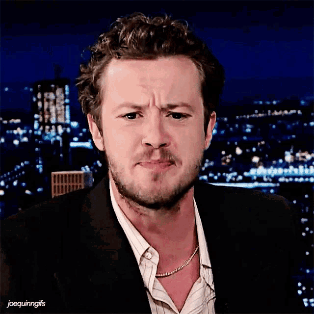 a man with a beard is making a funny face with the caption joequinngifs